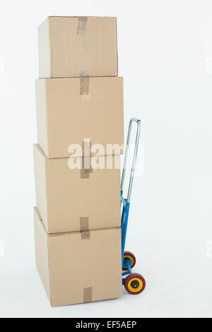 Cardboard boxes on trolley Stock Photo