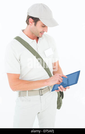 Delivery man using digital tablet Stock Photo