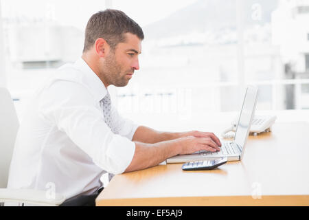 Focused businessman  working on his laptop Stock Photo
