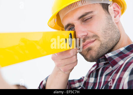 Close-up of technician using spirit level Stock Photo