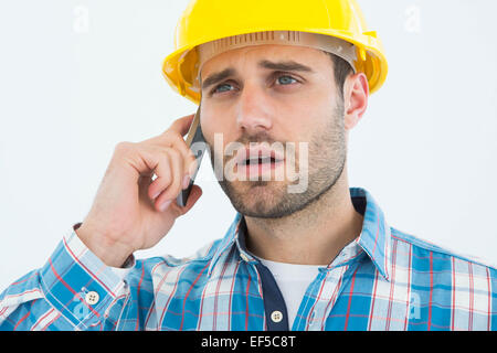 Carpenter using cellphone Stock Photo