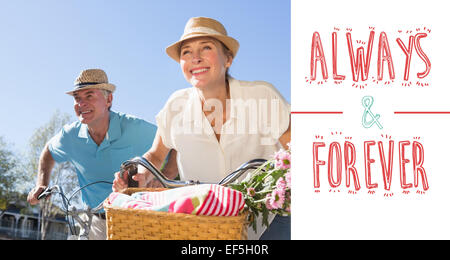 Composite image of happy senior couple going for a bike ride in the city Stock Photo