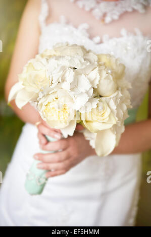 Bridal roses and peony bouquet wedding flowers Stock Photo