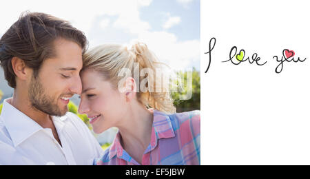 Composite image of cute couple spending time together outside Stock Photo