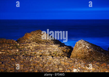 Giants Causeway at night in the blue hour north antrim coast northern ireland Stock Photo