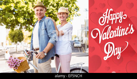 Composite image of happy mature couple going for a bike ride in the city Stock Photo