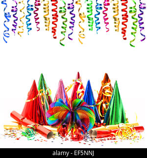 colorful shiny streamer and carnival party decoration isolated on white background Stock Photo