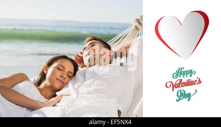 Composite image of peaceful couple napping in a hammock Stock Photo