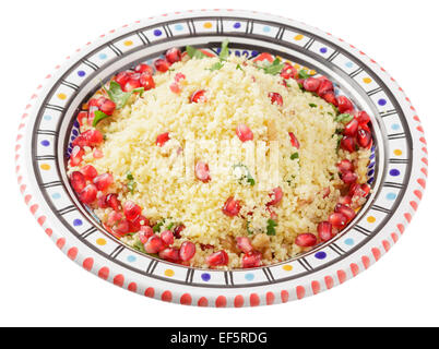 couscous with pomegranate seeds, walnuts and parsley Stock Photo