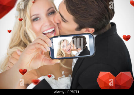 Composite image of valentines couple Stock Photo
