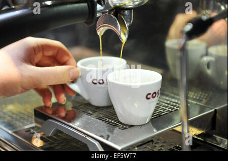Making espresso coffee in a Costa Coffee shop, UK