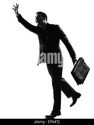 silhouette caucasian business man  running hailing full length on studio isolated white background Stock Photo