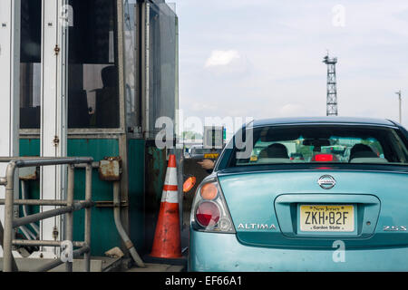 Car paying the toll on the New Jersey Turnpike in Secaucus, New Jersey, USA Stock Photo