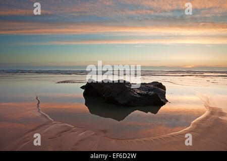 rock pool on the sandy shores of bedruthan steps Stock Photo