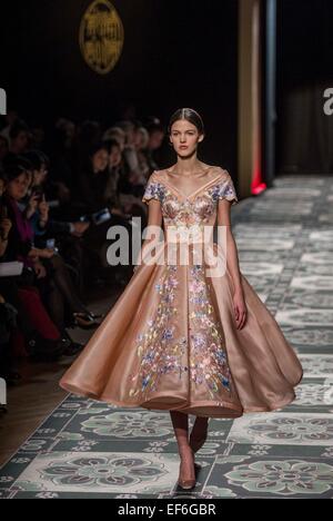 Paris, France. 27th Jan, 2015. A model presents a creation by Laurence Xu during his 2015 Haute Couture Spring-Summer collection fashion show in Paris, France, Jan. 27, 2015. Credit:  Chen Xiaowei/Xinhua/Alamy Live News Stock Photo