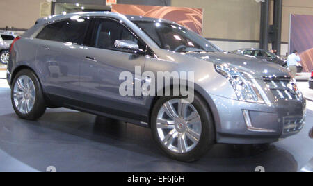 The Cadillac Provoq, shown at the 2008 North American International Auto Show, is a concept vehicle designed to showcase Cadillac's vision for a luxury hybrid SUV. With a sleek, futuristic design, the Provoq features a hydrogen fuel cell powertrain, combining environmental responsibility with premium luxury. Its cutting-edge technology and spacious interior make it a forward-thinking model for Cadillac's future in eco-friendly vehicles. Stock Photo