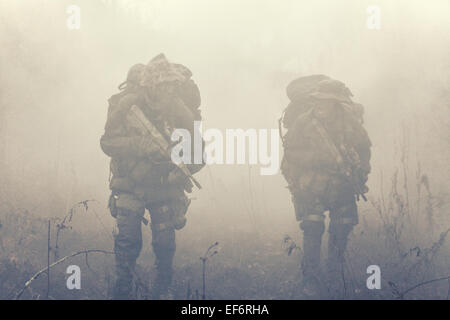 Group of soldiers in the smoke Stock Photo