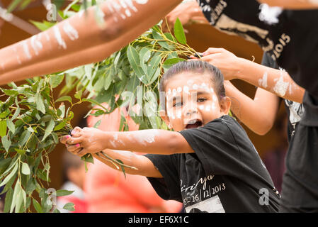 Aboriginal child with face paint blue yellow 1447 Stock Photo - Alamy