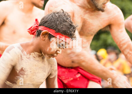 Aboriginal child with face paint blue yellow 1447 Stock Photo - Alamy