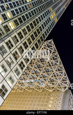 Evening view of Southeast Financial Center towers and suspended glass structure above plaza, SE 2nd Street, Midtown Miami, USA. Stock Photo