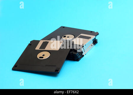 disk floppy magnetic computer data storage support on a blue bac Stock Photo