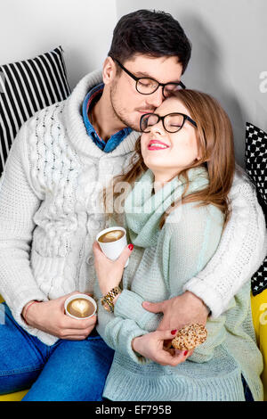 Couple on the couch at home Stock Photo