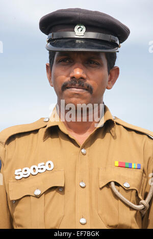 SRI LANKAN POLICE MAN AT GALLE FORT Stock Photo