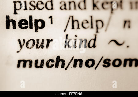 macro of word help definition in dictionary Stock Photo