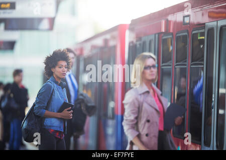 People boarding train Stock Photo