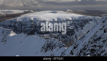 St Sunday Crag and Striding Edge from near the summit of Helvellyn on a sunny winters day in the Lake District, Cumbria, UK Stock Photo