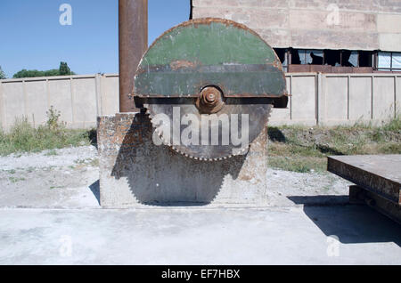 Old abandoned production for trimming stone slabs Stock Photo