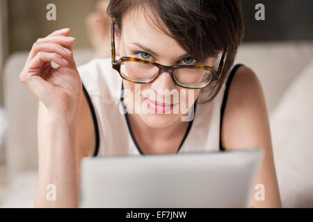 Portrait of a woman using a digital tablet