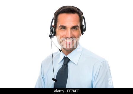 Portrait of a smiling man with headset working as a call center operator Stock Photo
