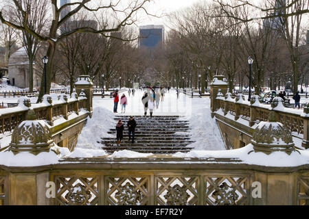 NEW YORK CITY – JANUARY 2015: Crowds of people enjoy the recent snowfall in Central Park after a big winter blizzard Stock Photo