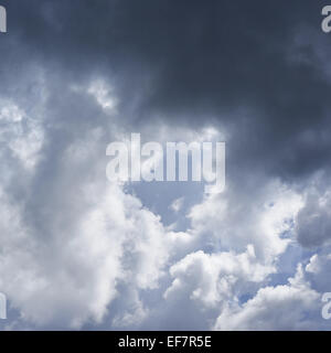 Sun hidden behind the clouds Stock Photo