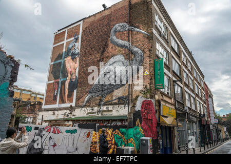 London urban street graffiti in the Brick Lane area of the city - EDITORIAL USE ONLY Stock Photo
