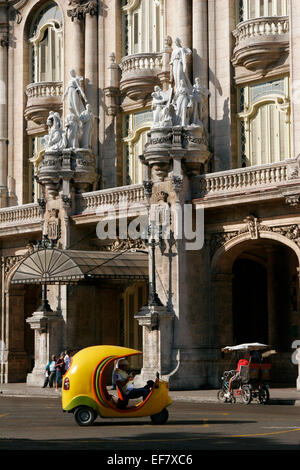 Yellow coco taxi in Havana, Cuba Stock Photo