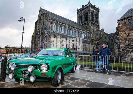 Paisley near Glasgow, Scotland, UK. 28th January, 2015. The 2015 Rally Monte Carlo Historique set off from outside the 12th century abbey in Paisley city centre. Hundreds of spectators are expected to brave the cold weather to enjoy the start of the rally, This is the 5th anniversary of the rally leaving from Scotland and in celebration the local car clubs and council have laid on various entertainments. Credit:  Findlay/Alamy Live News Stock Photo
