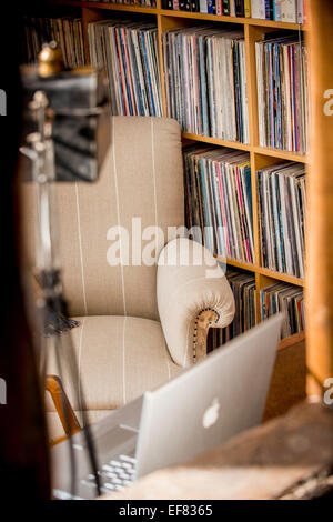 A restored chair by One-Off Chairs in a home owners study. Stock Photo