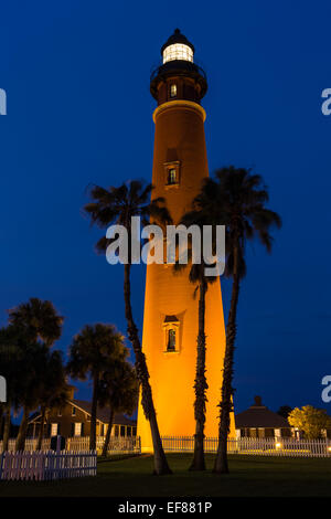 Twilight descends over Ponce de Leon Inlet Lighthouse creating a beautiful night scene. Located in Ponce Inlet near Daytona Beac Stock Photo