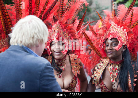 London Mayor Boris Johnson visits the Notting Hill Carnival on Bank Holiday Monday and is greeted enthusiastically by Londoners and Carnivalists alike. Stock Photo