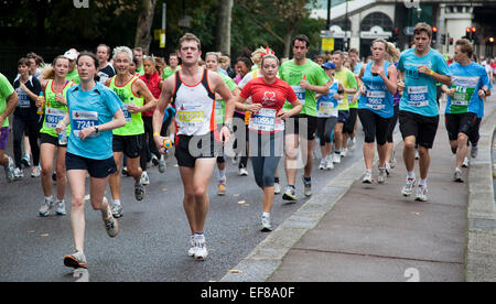 Thousands of runners took to the London streets in the Royal Parks Foundation Half Marathon 2011 to raise money for charities. Stock Photo