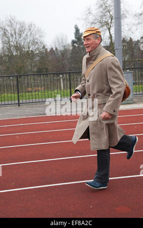 Michael Palin hopping. Terry Jones and Michael Palin of Monty Pythons fame today, Saturday 3 March, staged a public 'Hopathon' to mark the DVD release of “Ripping Yarns The Complete Series”, and as an homage to the episode entitled Tomkinson’s School Days at the Athletics Track in  Hampstead Heath, London. Stock Photo