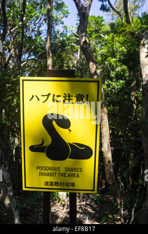 Sign warning of poisonous habu snakes on Tokashiki Island, Okinawa, Japan Stock Photo