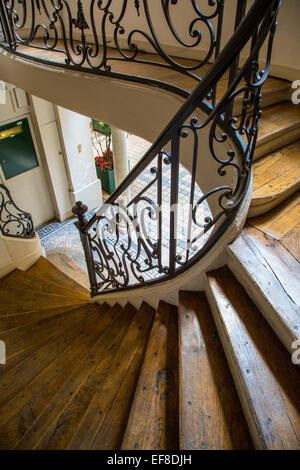 Curved staircase in Saint Germain des Pres, Paris, France Stock Photo