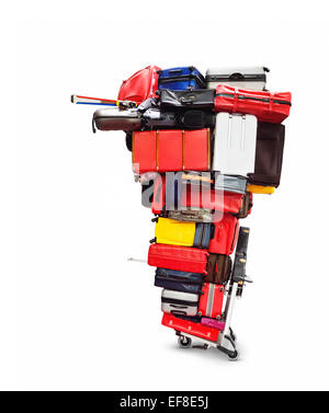 Airport baggage cart with an enormous pile of luggage on it, stacked colorful suitcases isolated on white background with clippi Stock Photo