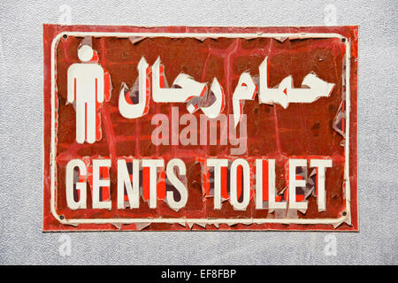 Toilet sign in English and Arabic Stock Photo