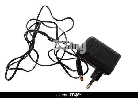 Stained black electric adapter isolated  on white background  and clipping path Stock Photo