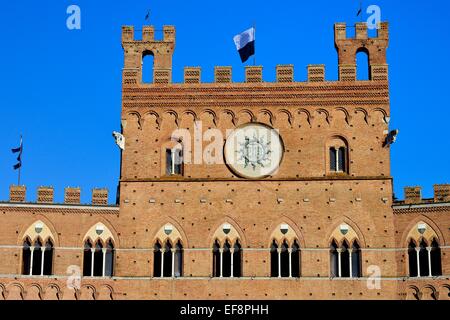Facade of the Palazzo Pubblico, City Hall, Piazza del Campo, Siena, Province of Siena, Tuscany, Italy Stock Photo