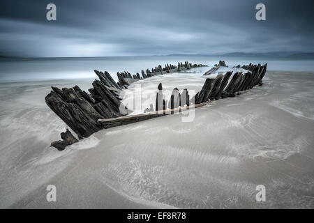 Shipwrecked boat on beach, Rossbeigh Strand, County Kerry, Ireland Stock Photo